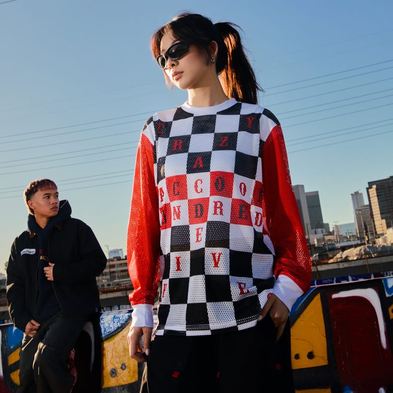 100 Thieves x Crazy Raccoon Flat Track Mesh Jersey worn view